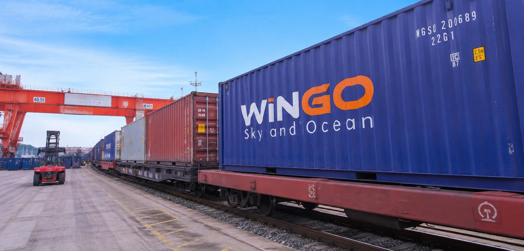 Wingo Logistics cargo container at an international rail freight station